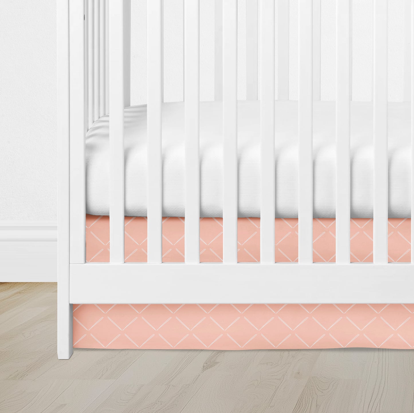 CRIB SKIRT - FAULTY ARROW IN DUSTY PEACH