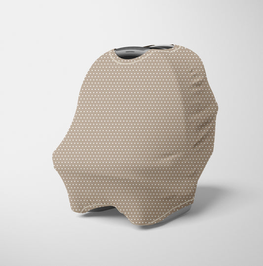 Tan and white polka dot car seat cover for babies, soft stretchy multi-use nursing and shopping cart cover.