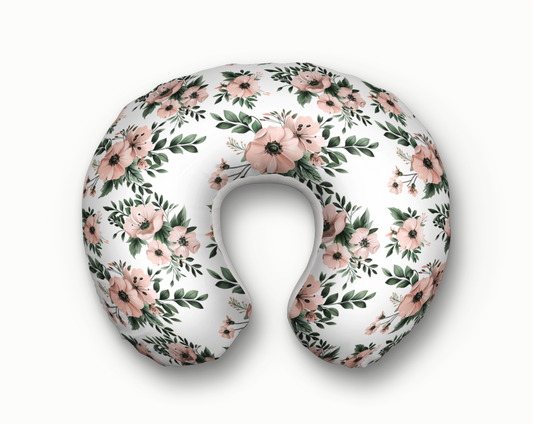 Blush pink floral nursing pillow cover with green leaves, designed to fit Boppy brand pillows.