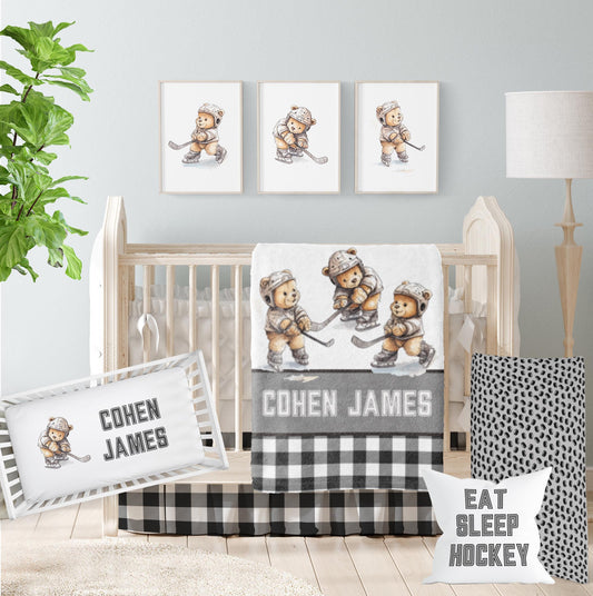 Crib bedding set with personalization in a hockey and teddy bear theme