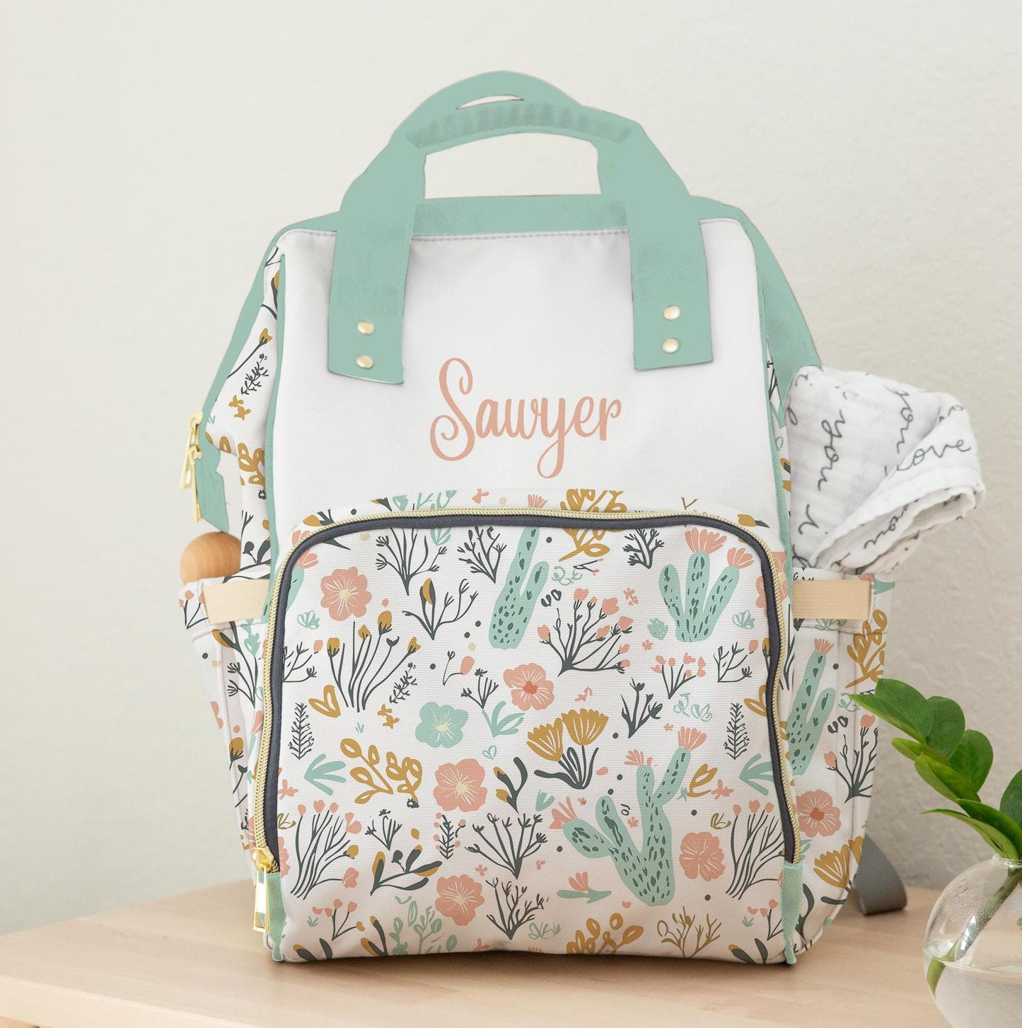 mint and peach desert and cactus personalized diaper bag backpack for baby girl