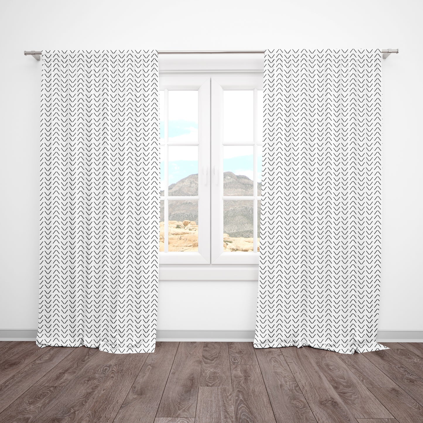 Neutral blackout curtains with black arrow print for a stylish modern nursery. Blocks sunlight and pairs with any neutral or boho theme.
