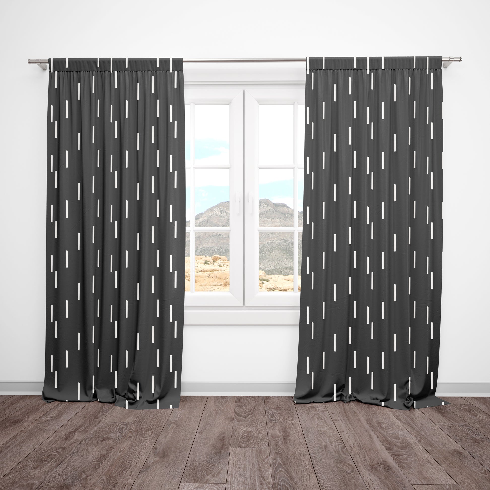 Black blackout curtains with white dash pattern in modern nursery setting